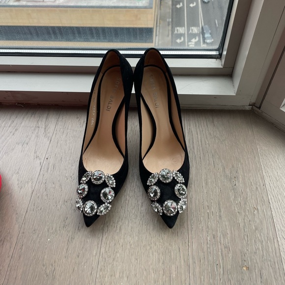 Italian high heel shoes with diamond embellishments.